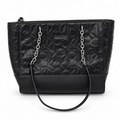 Calvin Klein black embossed monogram tote handbag front