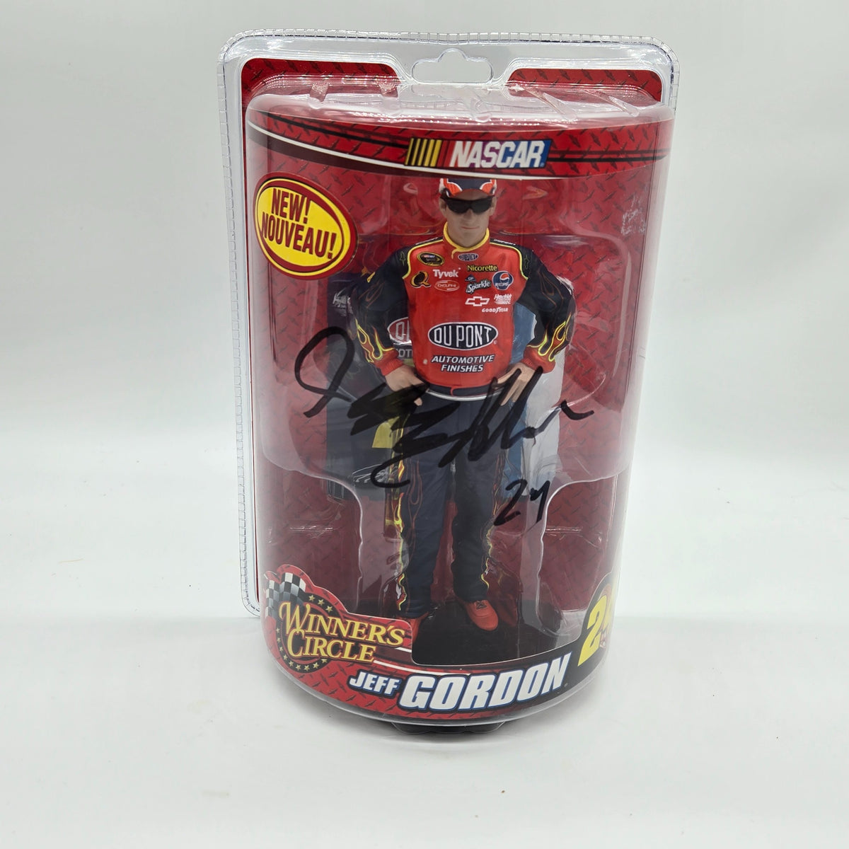 Jeff Gordon Winners Circle NASCAR figure in package with black marker signature on front