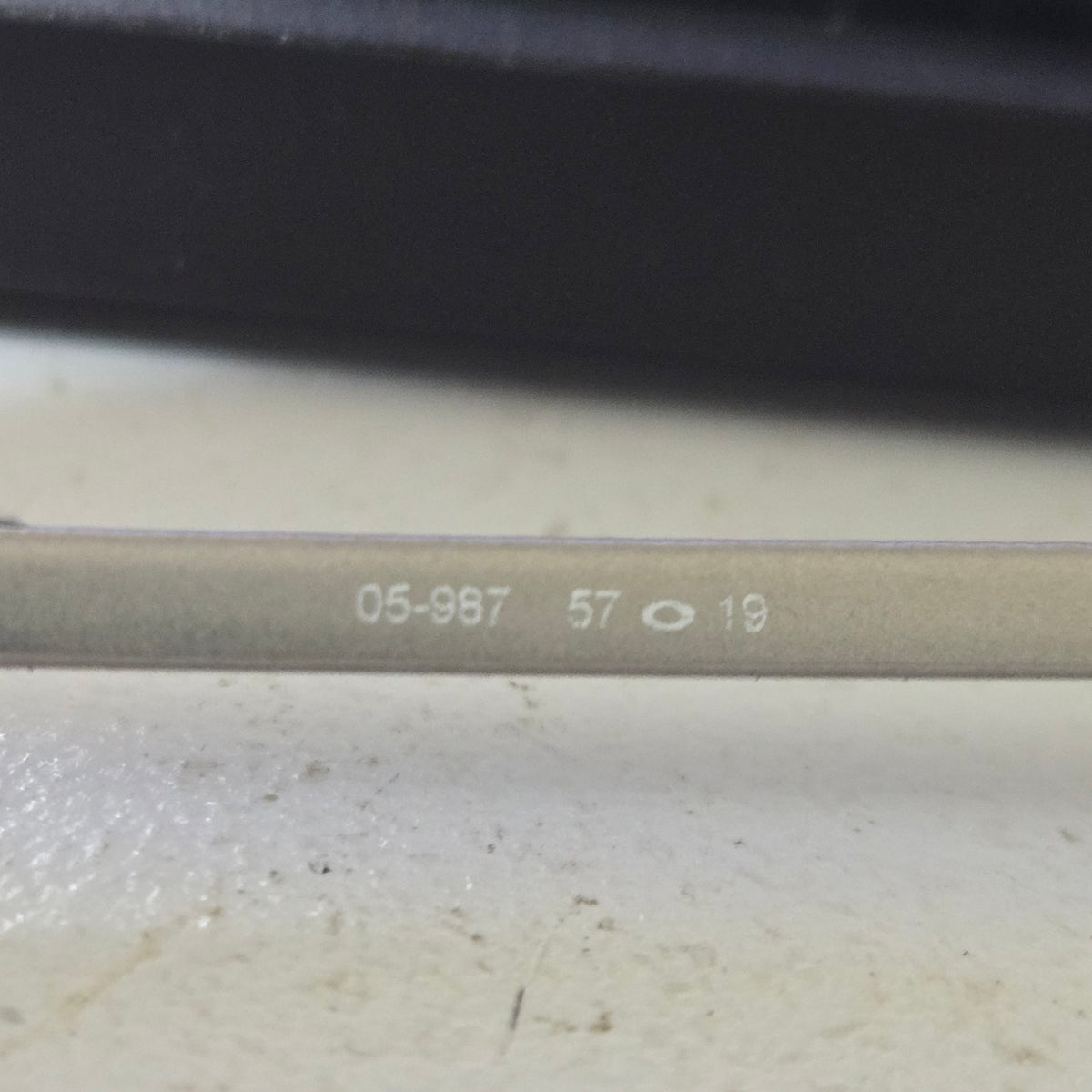 Oakley Square Wire 05-967 57-18 model and size marking