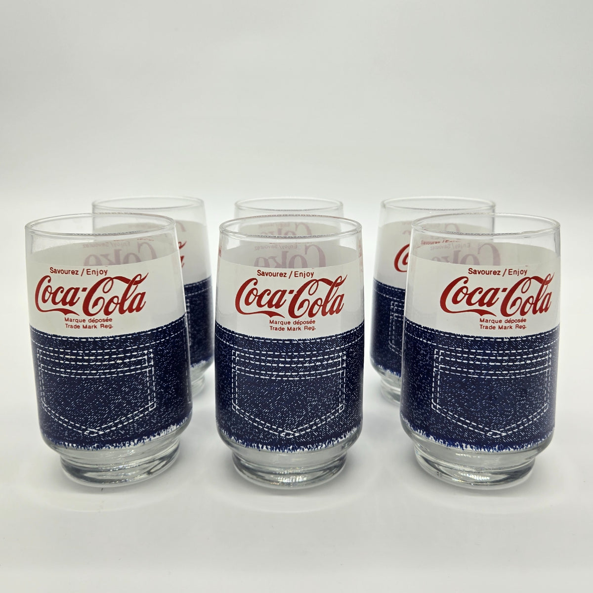 Six vintage Coca-Cola denim pocket glasses front view
