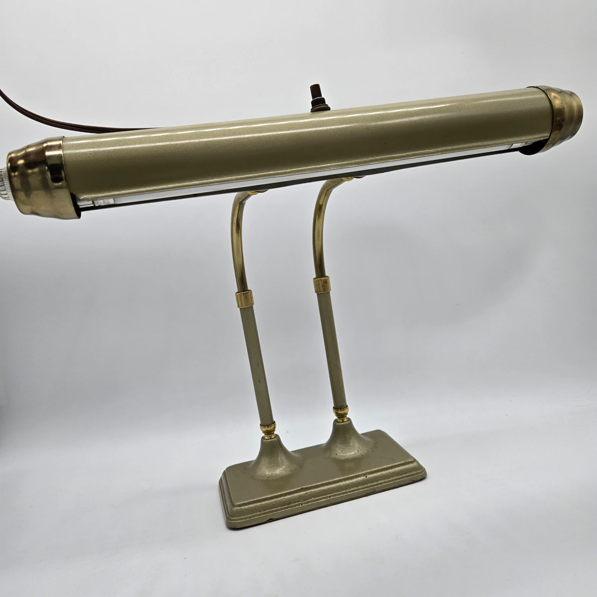 Vintage double-post fluorescent desk lamp in olive and brass-tone finish